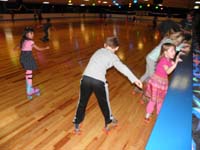 05-Kenny_got_adventurous_hugging_trying_to_skate_away_from_the_wall
