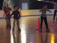 22-Jeb,Aiden,Kenny,Lexi_in_background_skating-hard_to_get_clear_photos_with_camera_indoors