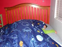 03-Kenny_sleeping-tooth_fairy_delivered_the_silver_dollar-when_Daddy_got_home_from_night_City_Tour