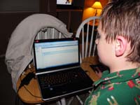 07-Daddy_configured_Mommy's_old_laptop_for_Kenny's_use-he_reads_his_first_email