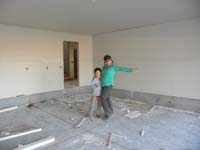 52-Kenny_and_Mommy_in_the_new_house's_garage-newly_drywalled-Feb_21
