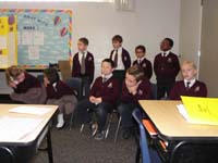 09-little_bored_while_the_other_part_of_the_class_presents_their_project-Daddy_didn't_record_it