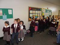 15-class_getting_lined_up_to_go_to_computer_lab-parents_must_leave_now_and_quickly