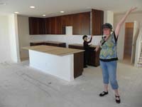 27-20150313-Mommy_is_very_happy_to_see_the_cabinets_installed_in_the_kitchen