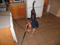 60-Kenny_helping_to_clean_the_house_for_the_last_time-we_are_moving_to_the_new_house_in_two_weeks