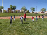 02-backing_up_to_catch_fly_ball_drill-Coach_Alex_leads
