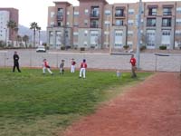 21-Daddy_working_on_fly_balls_with_the_kids