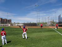 35-fielding_practice_before_the_game-Kenny_has_his_eye_on_the_fly_ball