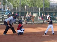 68-he_misses_a_ball_thrown_by_the_pitcher