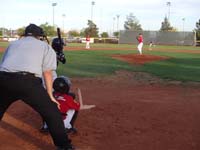 77-playing_catcher-this_time_from_perspective_as_coach_backup_behind_umpire