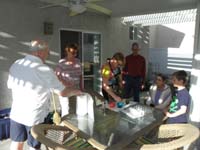 01-last_Easter_at_old_house-family_and_grandparents_ready_to_decorate_eggs_from_our_backyard_patio