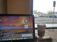 01-20150414-Mommy_showing_time_on_computer_in_Starbucks_biding_time_until_she_can_get_keys_to_new_house