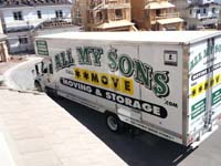 20-moving_truck-lots_of_new_construction_in_the_neighborhood