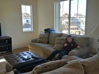 28-Kenny_relaxing_in_the_family_room_watching_his_Kindle