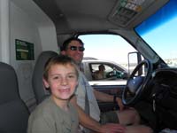 40-Lisa_takes_picture_from_rental_truck-Kenny,Daddy,Mommy_holding_Rocky_in_background-we_are_moving
