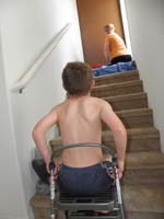 17-Kenny_finds_it_such_hard_work_that_he_needs_to_rest_and_supervise_Mommy