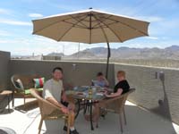 23-dinner_on_the_rooftop_deck_again-this_time_using_the_umbrella