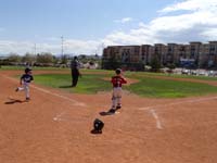 14-in_position_again_for_runner_advancing_to_home_plate