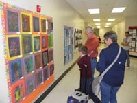 35-Kenny_showing_Baba_and_Poppy_the_art