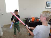 51-after_the_sugar_rush-time_to_play_more-Kaden_and_Jeb_duel_lightsabers