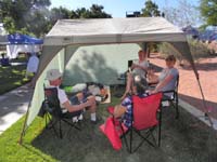07-Kenny,Mommy,Baba,Poppy,Grammy_hanging_out_under_canopy-hot_day_and_little_breeze