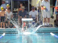 21-and_he_flops_into_the_pool-still_need_to_work_on_diving_into_the_pool