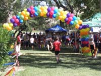 22-Kenny_reaching_the_finish_line-professional_photographer_taking_pictures