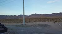 02-sunrise_from_rooftop_deck_looking_west_to_mountains_with_full_moon