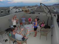 07-group_having_fun_on_rooftop_deck