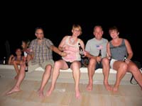 21-Daddy_climbed_onto_roof_for_picture_of_Mick,Mommy,Jerry,Cheyenne_sitting_on_roof_top_edge