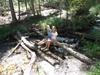 07-Kenny_and_Zoe_really_enjoyed_the_logs_and_the_creek