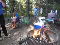 17-Mick_gave_a_little_puff_to_get_fire_blazing-previous_campers_didn't_douse_fire