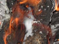 24-very_neat_wispy_smoke_and_flames_coming_out_of_the_log