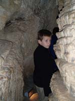 32-Kenny_walking_through_narrow_passage-Zoe_bailed_and_got_upset_just_as_tour_starting
