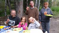 75-everyone_enjoying_pie_iron_pizzas-a_favorite