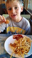 44-dinner_at_Pismo's_Coastal_Grill-very_good_food-Kenny_gets_popcorn_shrimp_and_fries