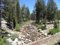 58-view_upstream_from_bridge-our_campsite_is_out_there_to_right