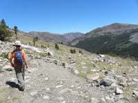 80-done_with_steep_uphill_through_forest-things_open_up