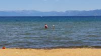 16-Mommy,Kenny_in_water-neat_to_see_different_blue_colors_due_to_the_changes_in_water_depth