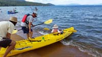 27-getting_into_the_kayak-Kenny_is_excited