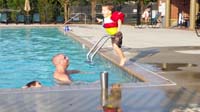 08-Wade_jumping_into_the_water_to_Tommy