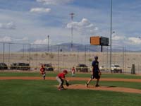 18-Kenny_fielding_a_ground_ball_hit_to_him_at_pitcher