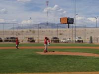 21-winds_up_to_make_the_play_to_first_base