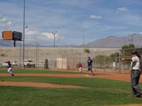 23-bad_throw-Adam_misses_it-RF_doesn't_back_up-runner_goes_to_second_base_on_the_overthrow-only_one_base