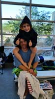 03-Kenny_on_Daddy's_shoulders-Daddy_not_thrilled_to_be_at_another_swim_meet