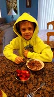 30-Kenny_is_cold_eating_breakfast_before_school-we_had_windows_open_at_night_in_mid_Sept