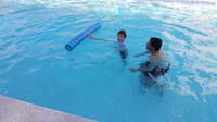 53-Kenny_and_Daddy_enjoying_the_pool