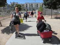 06-ran_a_triathlon-now_to_play_baseball-carting_all_the_gear_for_the_game