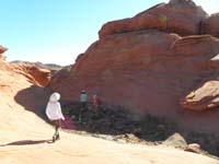 18-surprised_to_not_find_any_water_here-kids_check_out_dry_pond