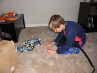 63-made_him_pose_for_a_picture,but_he_only_wanted_to_play_with_legos